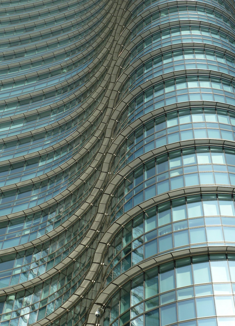 a very tall building with a clock on the side of it