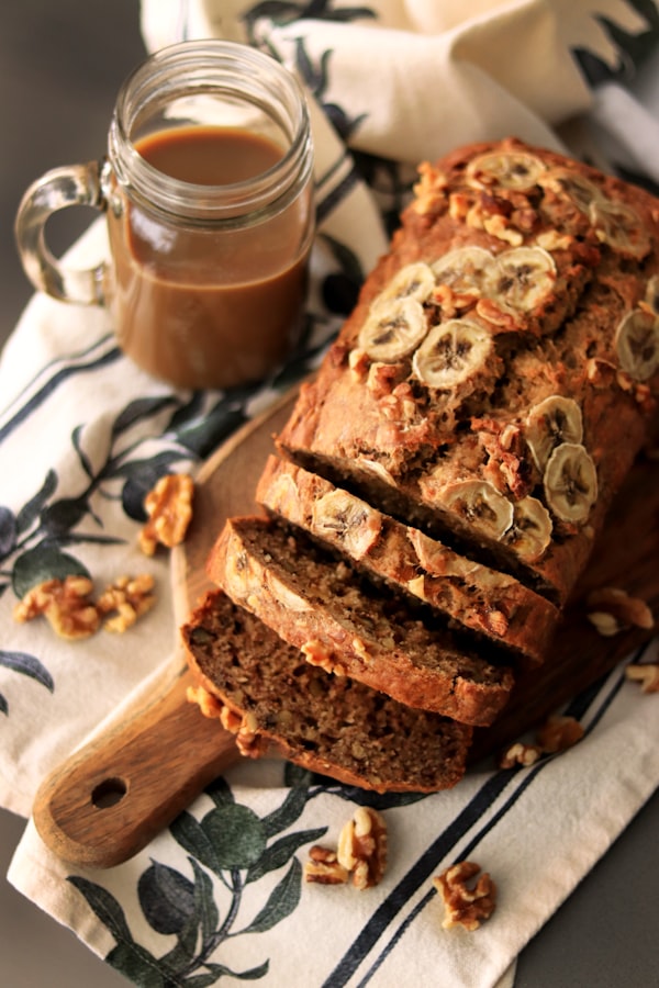 Sliced moist banana bread loaf with golden crust