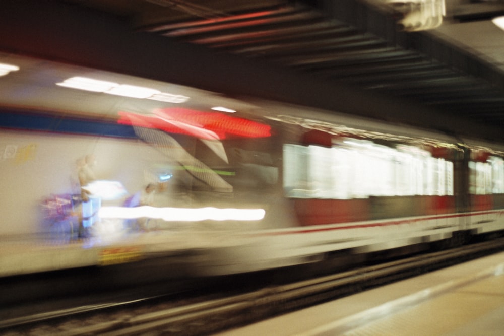 a blurry photo of a train in motion