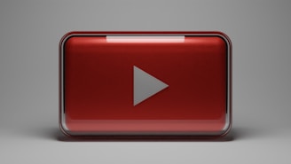 a red play button with a white arrow