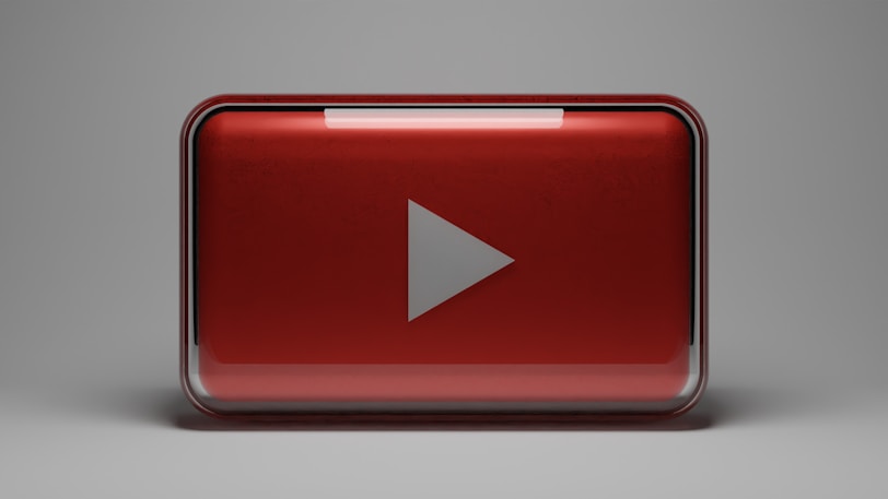 a red play button with a white arrow