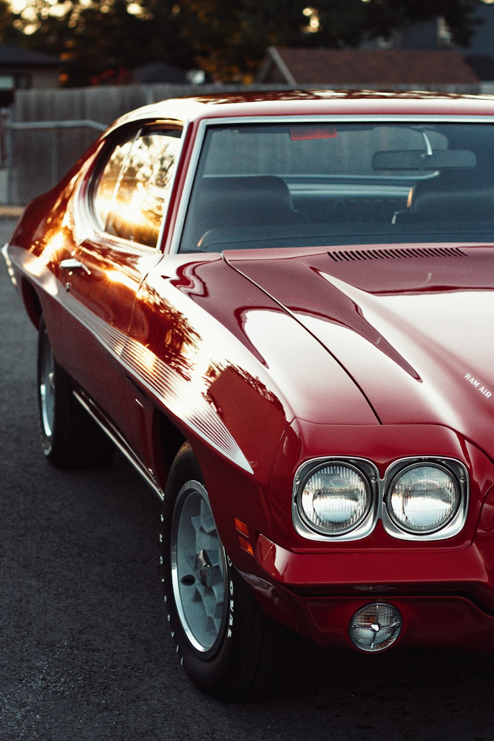 a red car parked in a parking lot