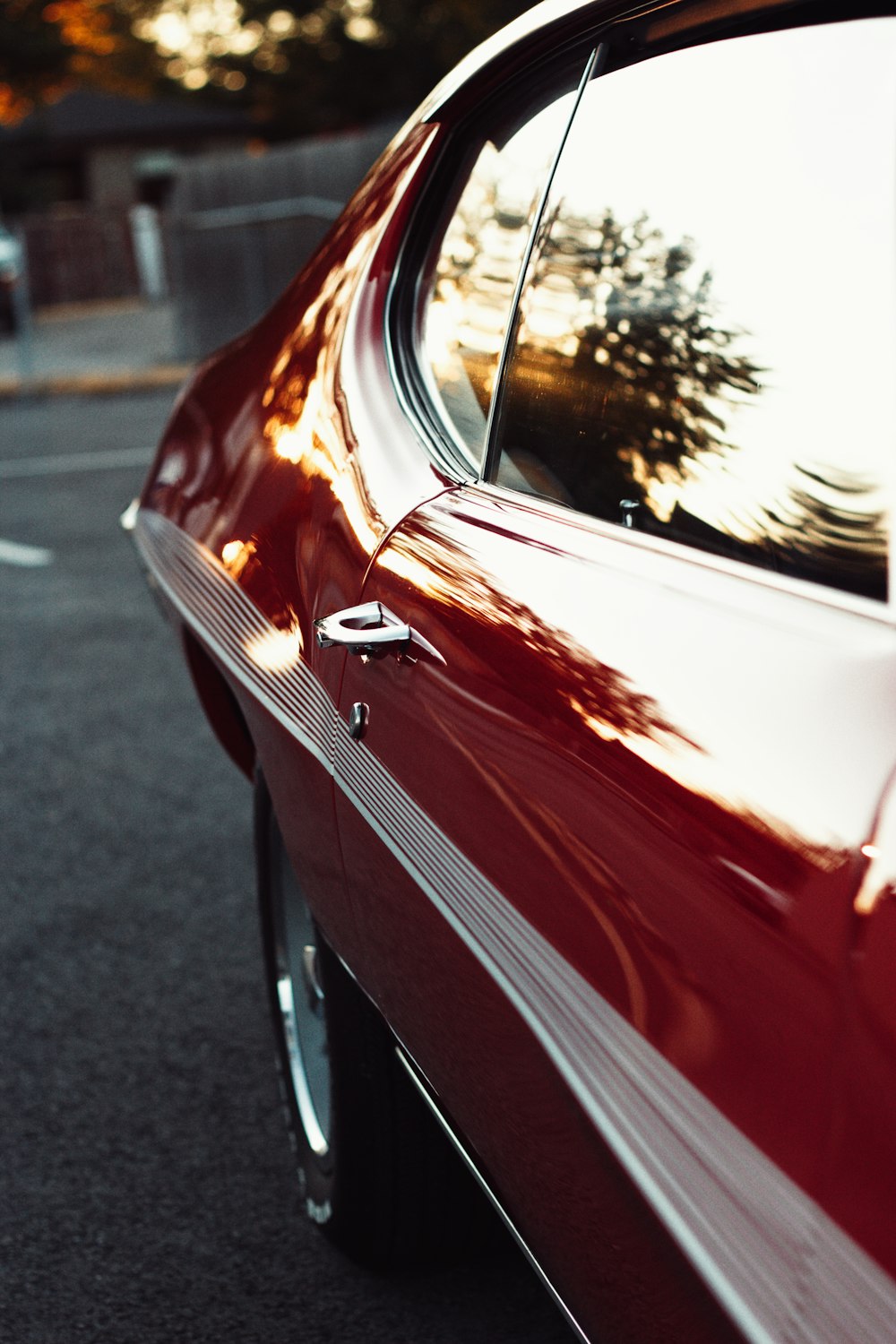 a red car parked in a parking lot