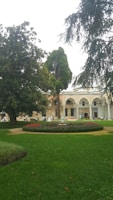 A lush garden with vibrant flowers and manicured lawns.