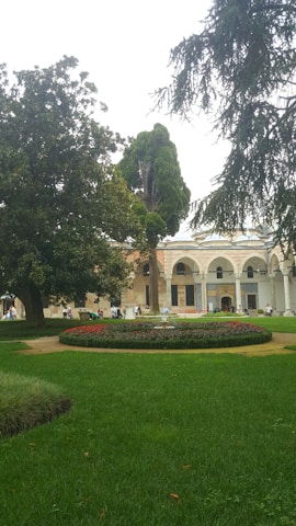 A lush garden with vibrant flowers and manicured lawns.