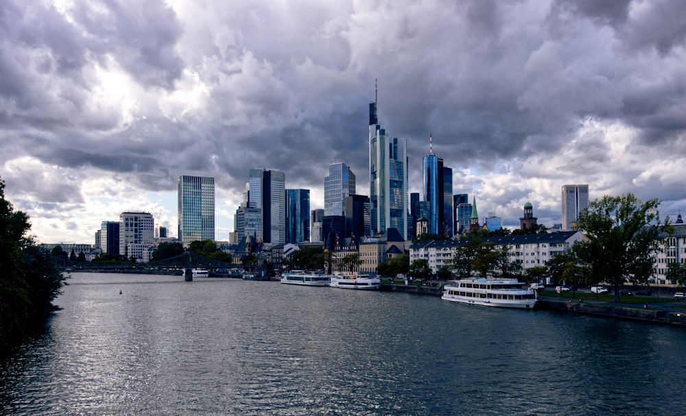 a large body of water with a city in the background