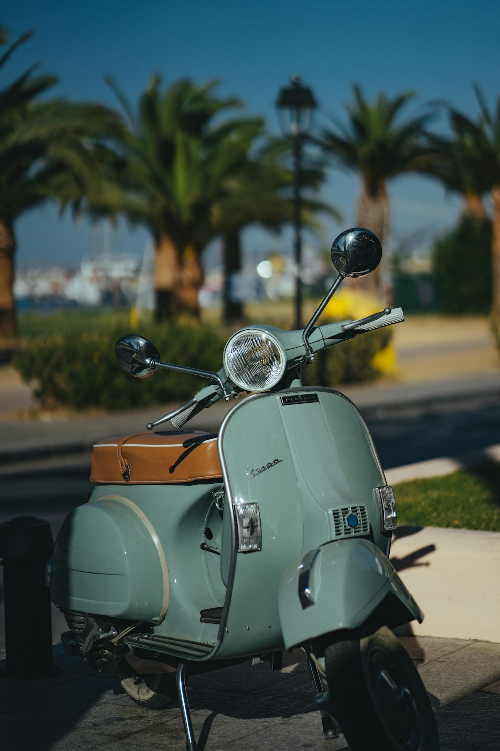 a scooter parked on the side of the road