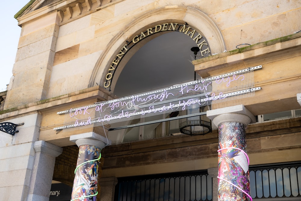 a large building with a sign on the front of it