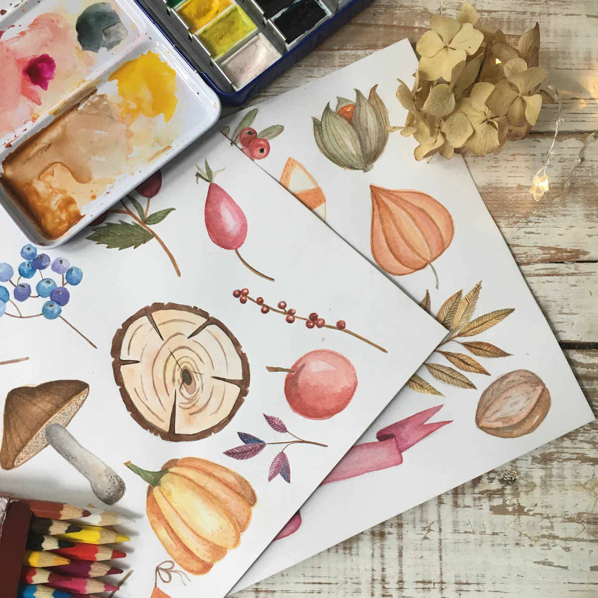 A table covered in art supplies