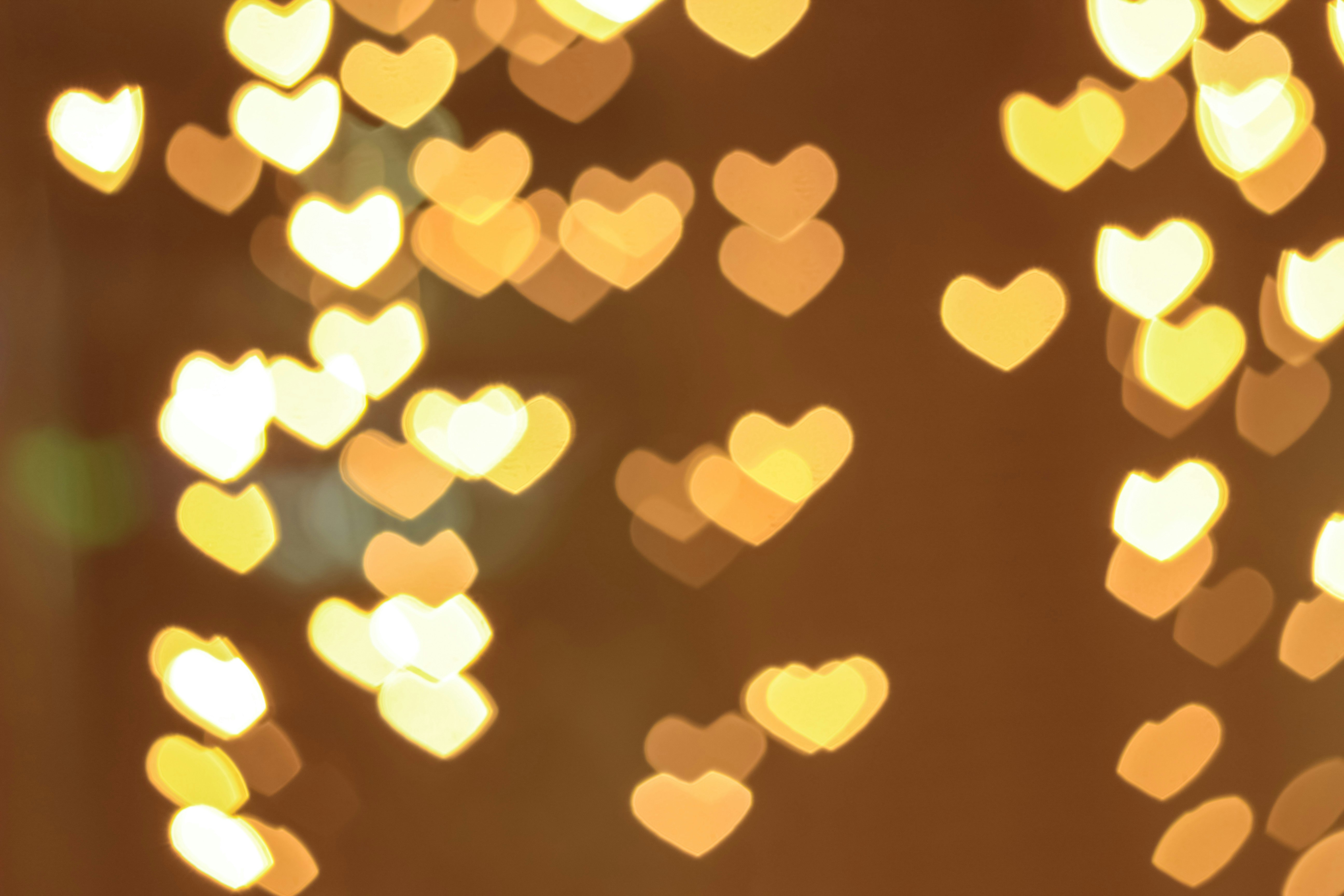Romantic wedding photography with warm golden-hour color grading and soft bokeh background