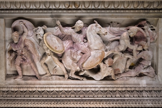 Roman generals negotiating treaties around a wooden table contrasted with fierce battle scenes on a rugged battlefield.