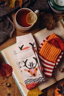 a cup of tea and a book on a table