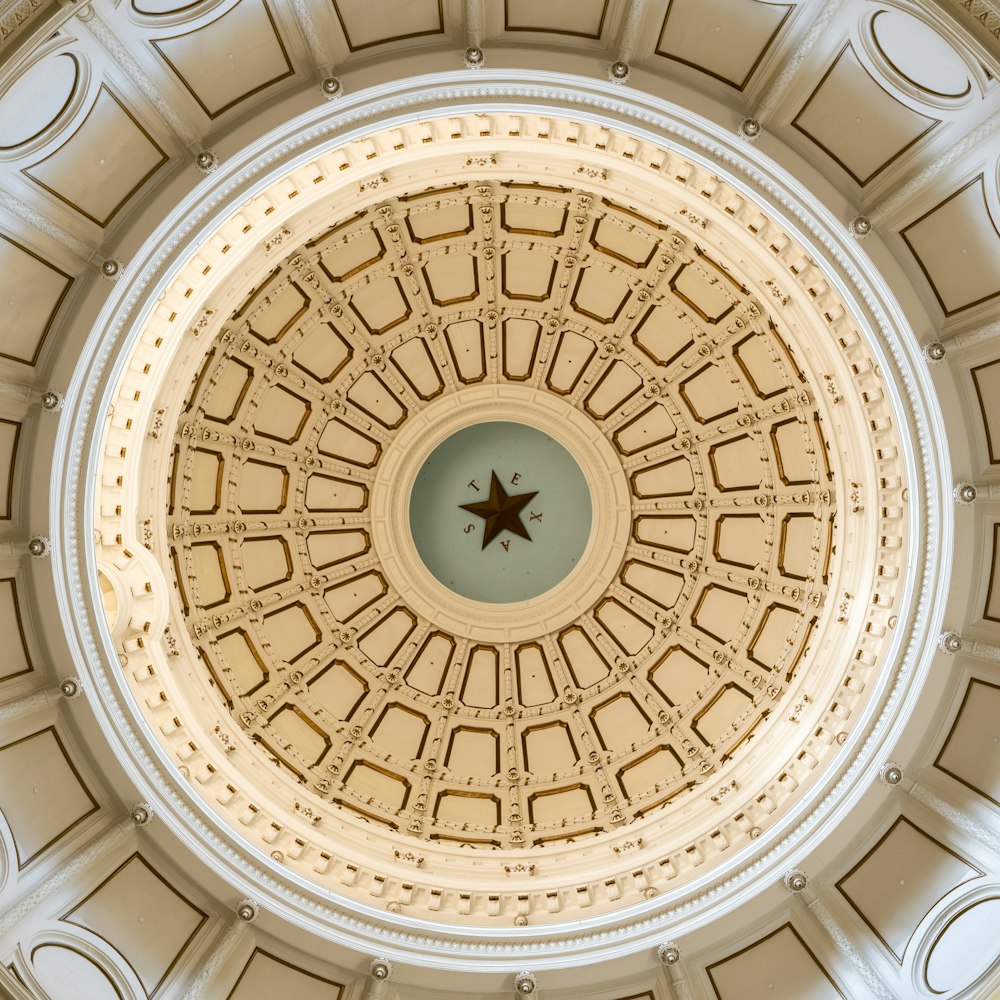 the ceiling of a building with a star on it