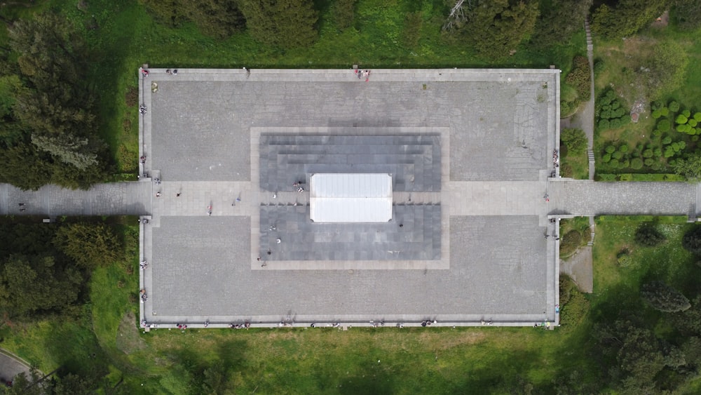 an aerial view of a square in the middle of a park