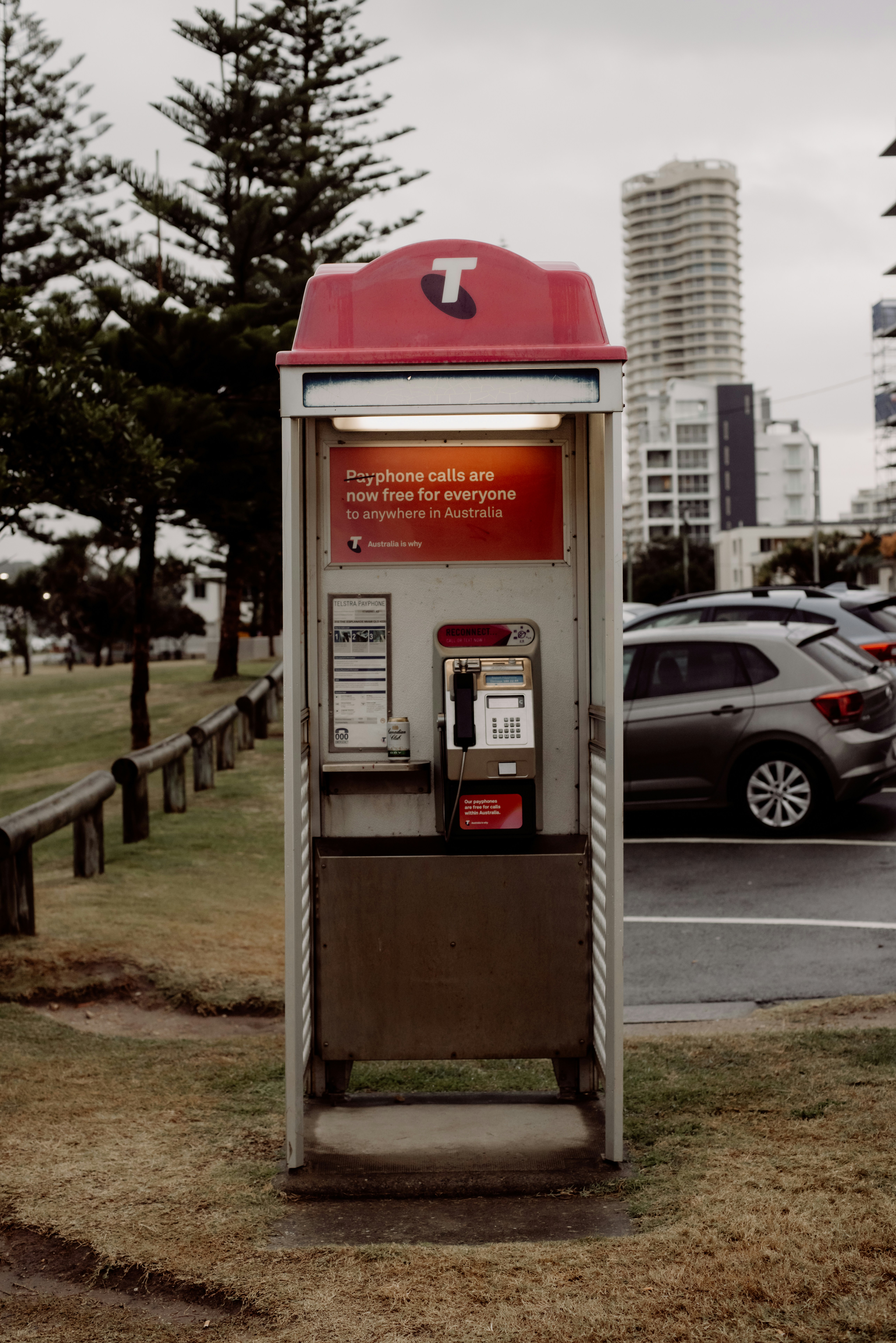 a parking meter sitting on the side of a road