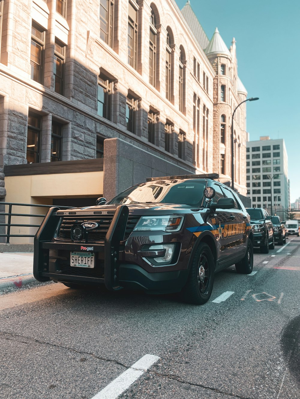 a police car parked on the side of the road