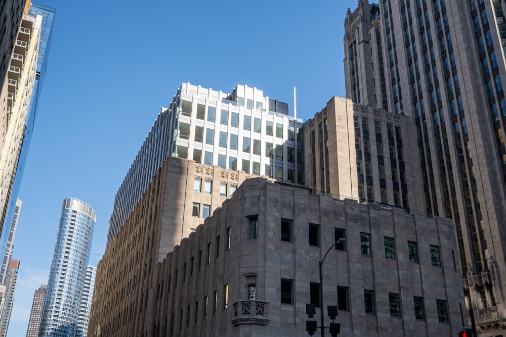 a group of tall buildings next to each other