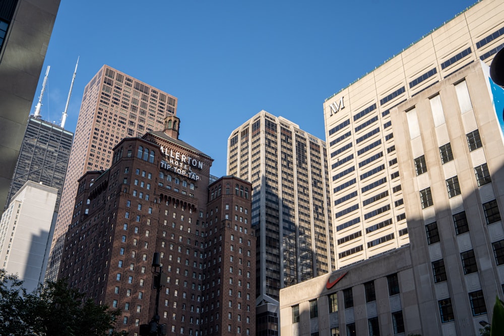 a group of tall buildings in a city