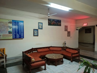 Cozy student lounge area with seating and informational posters.