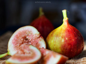 a couple of pieces of fruit sitting on top of a table