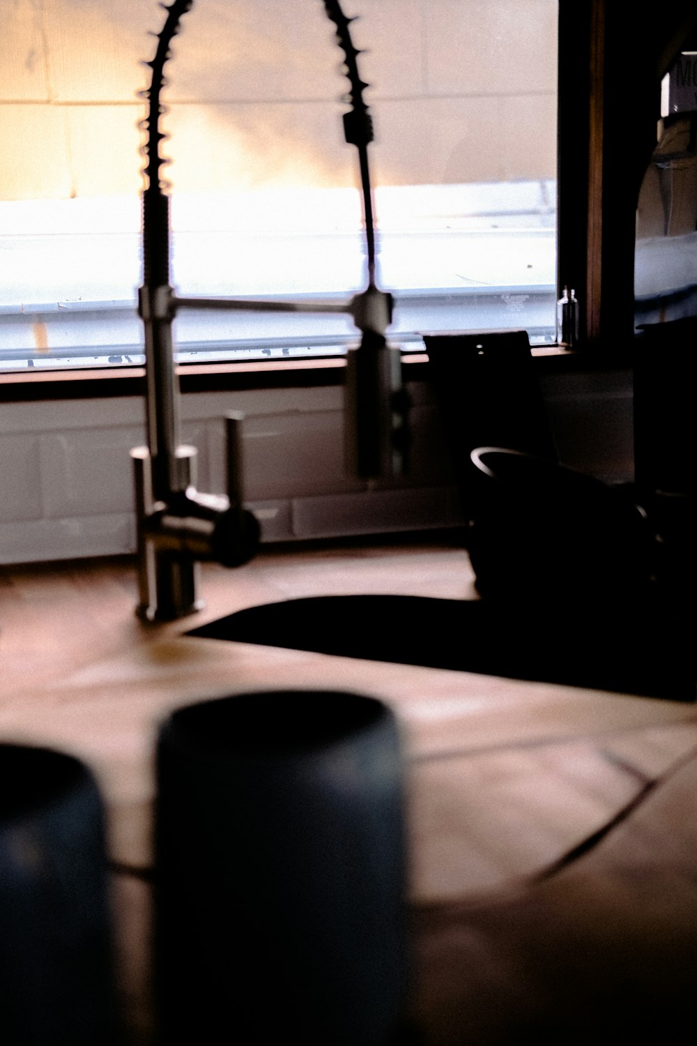 a kitchen with a sink and a window