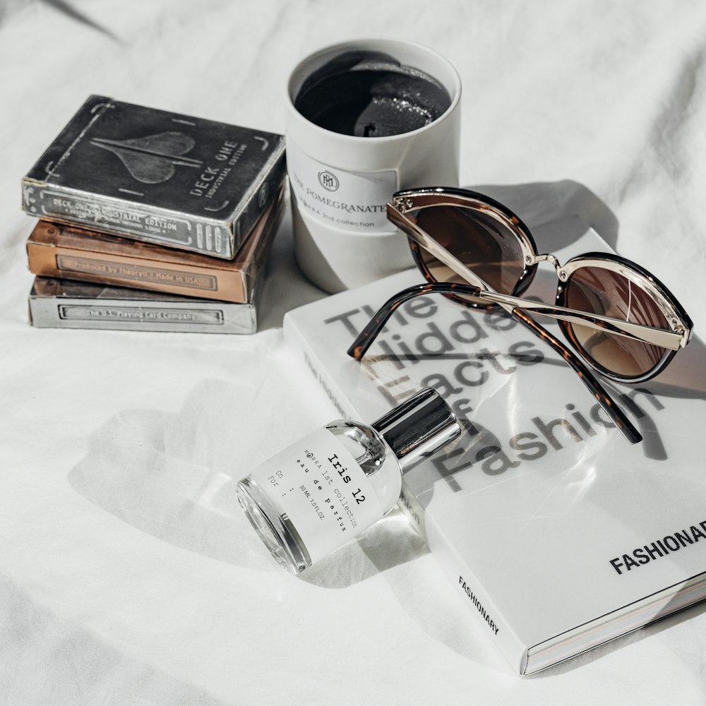 a table topped with books and a cup of coffee