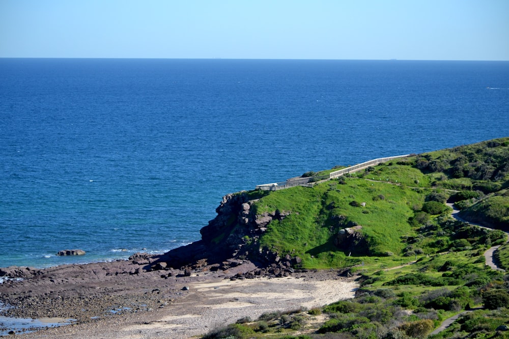 a view of the ocean from a hill