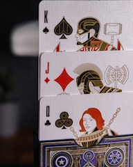 a stack of playing cards sitting on top of a table