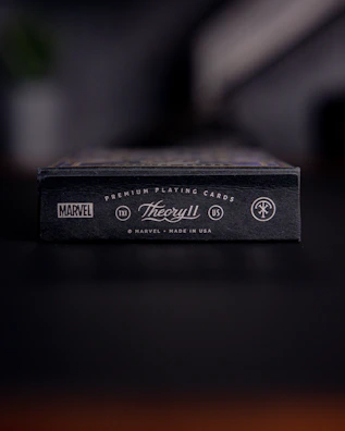 Premium pricing plan cards with glowing borders and subtle hover zoom effects in a dark luxury interface.