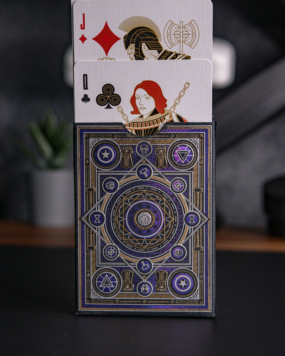 a card holder with a playing card inside of it