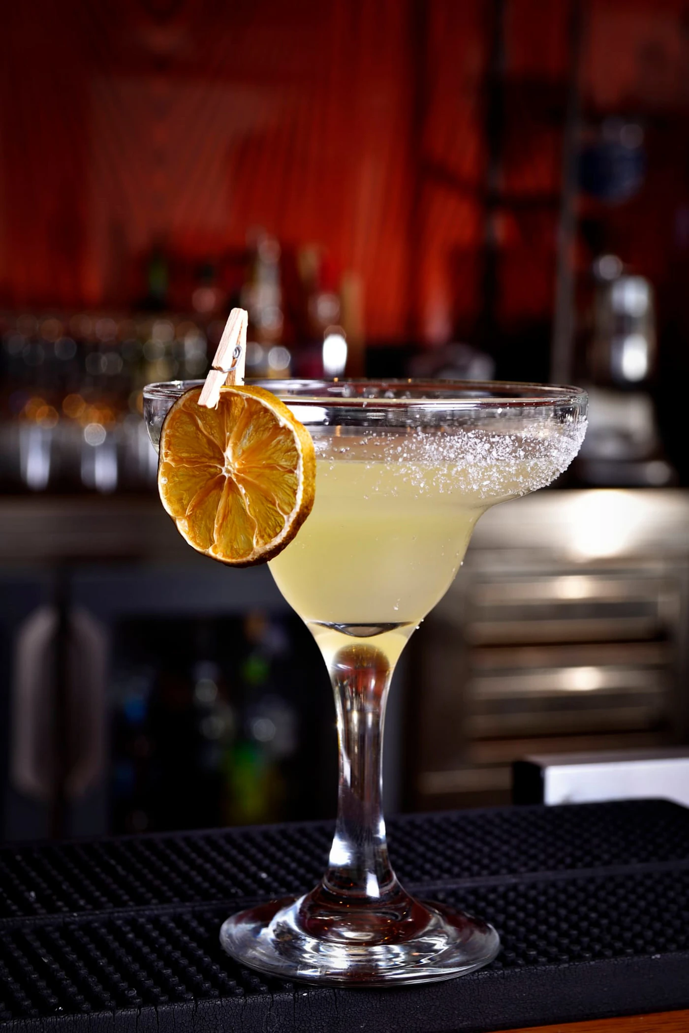 The tequila bar with rows of bottles and frozen-margarita machines