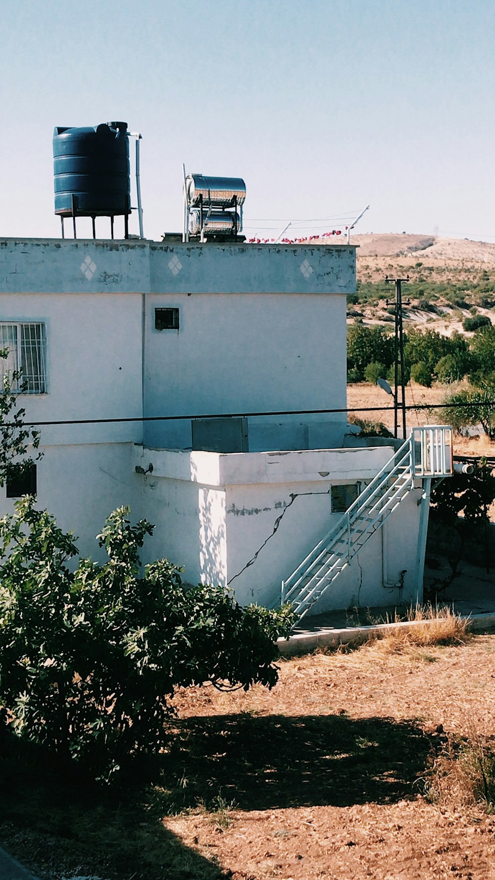 a building with a water tank on top of it