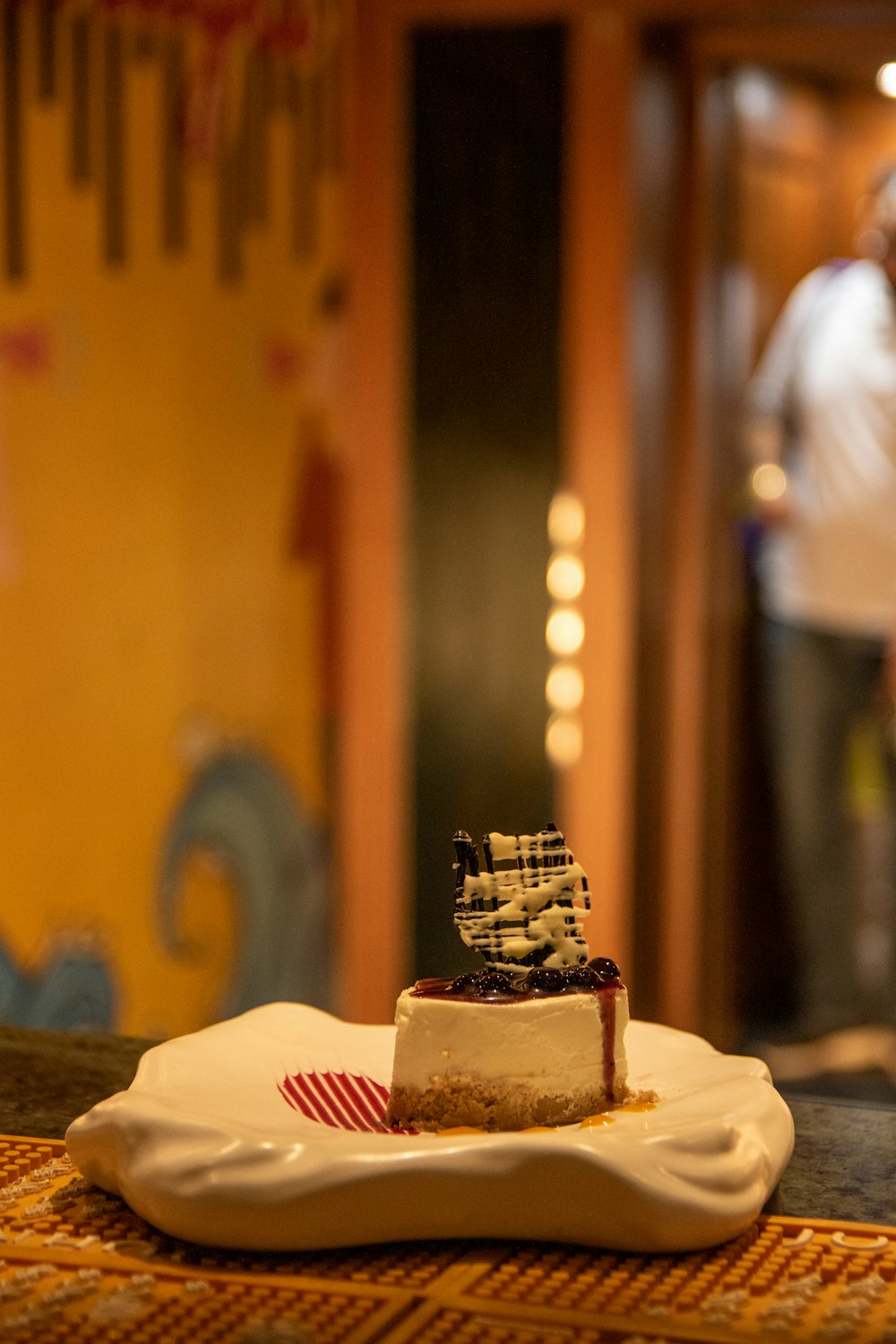 a piece of cake sitting on top of a white plate