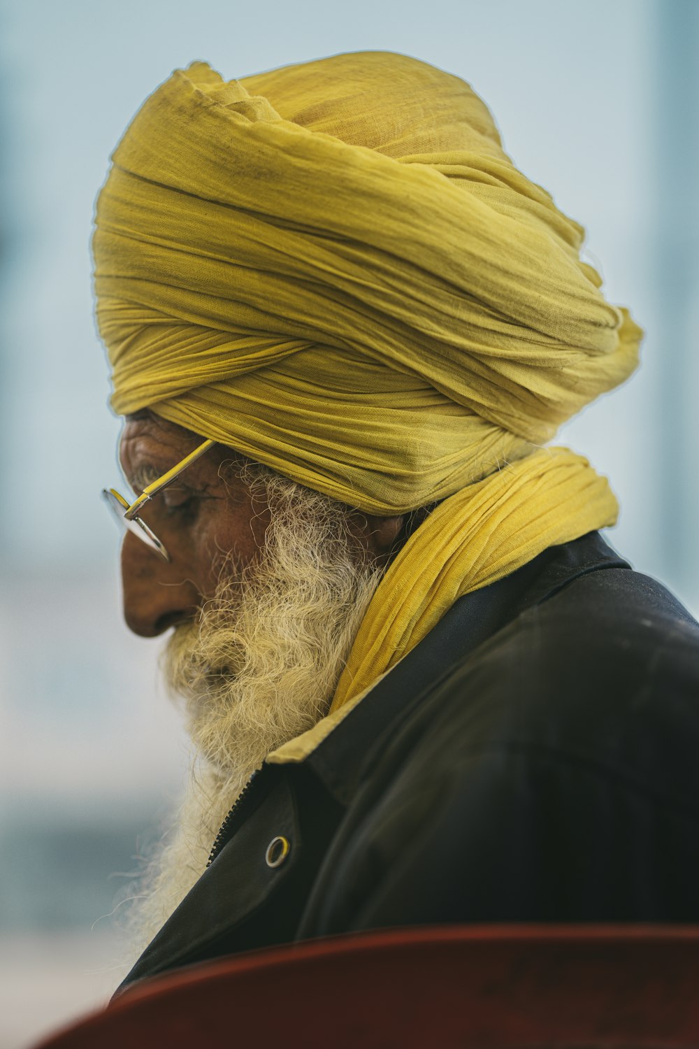 a man with a yellow turban on his head