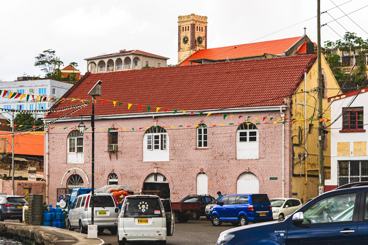 Historic brick commercial buildings and church towers in central St George's, Grenada