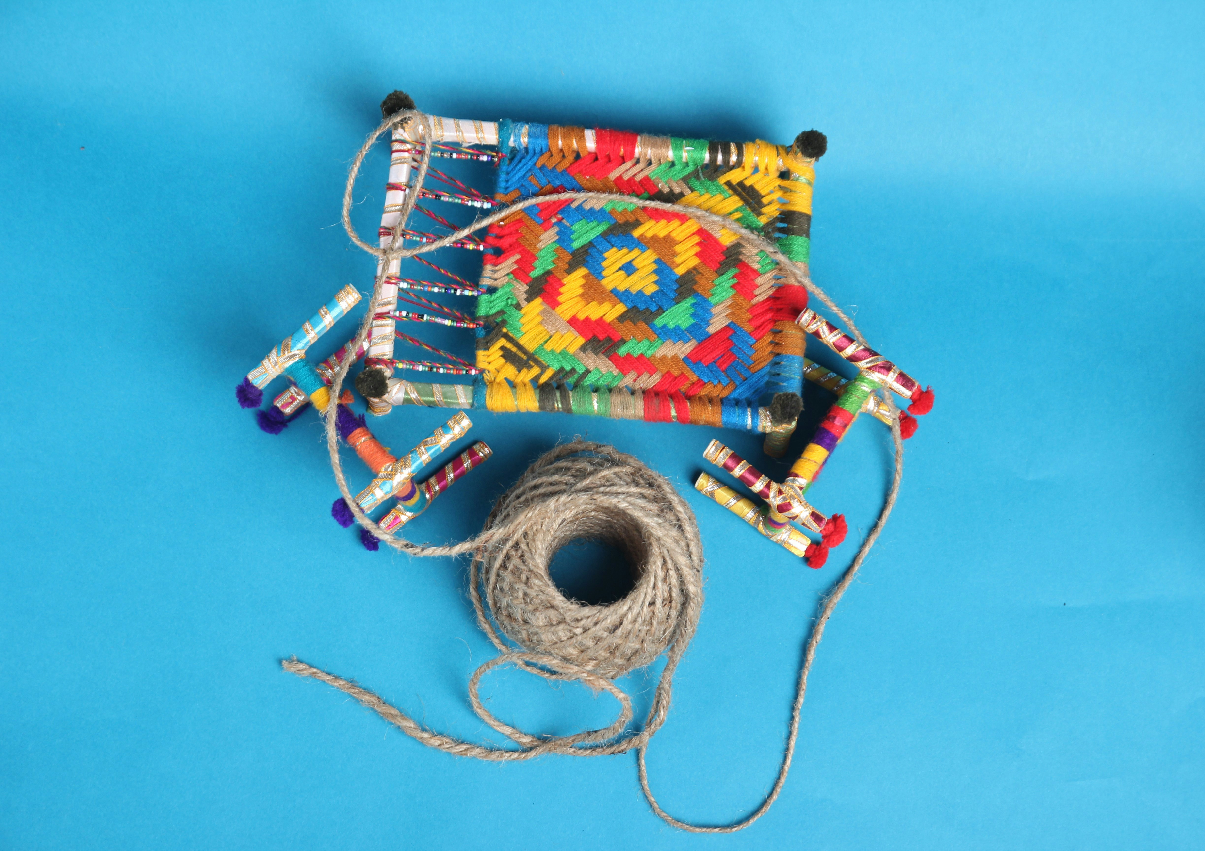 Crochet hook and yarn for coaster project