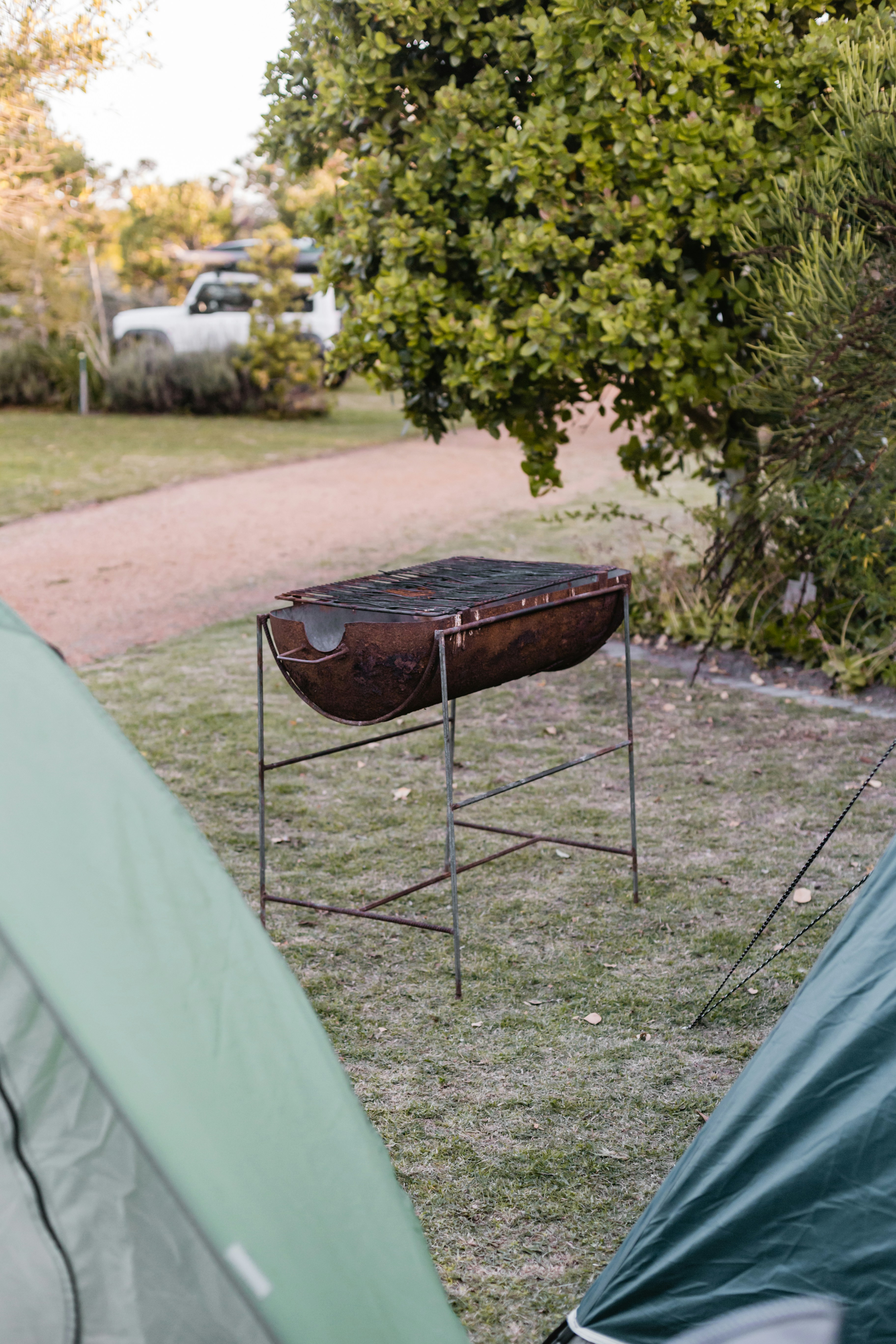 a couple of tents that are in the grass