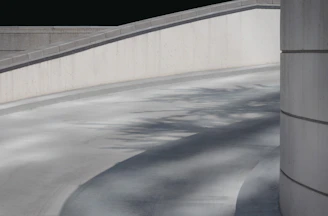 Smooth, compliant pram ramp blending seamlessly into a busy footpath.