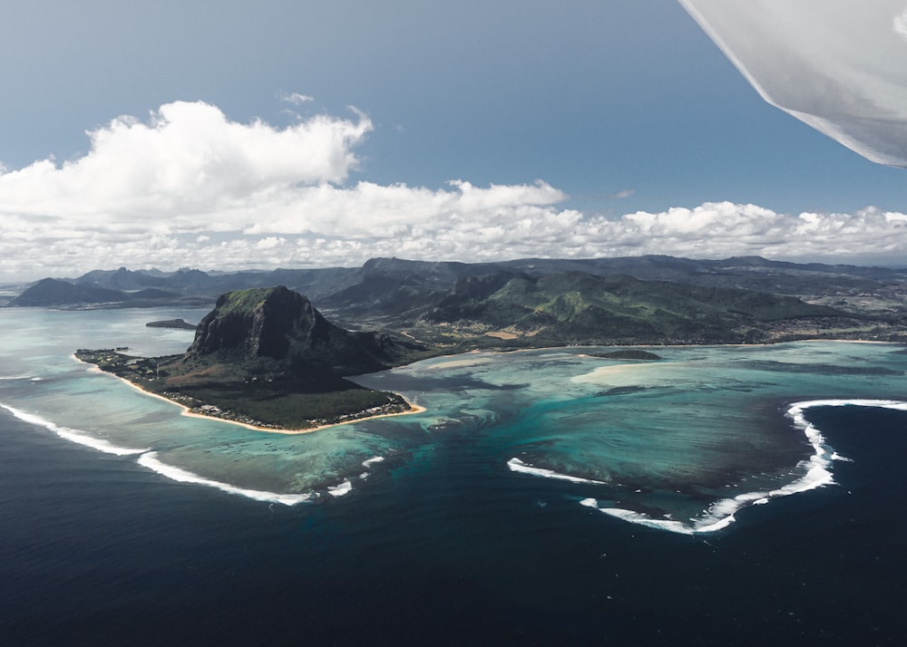 an aerial view of an island in the ocean