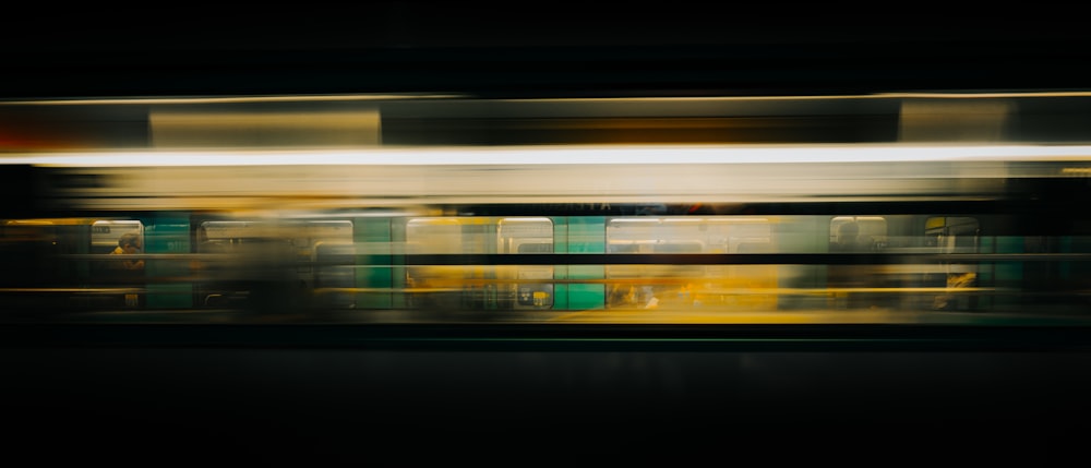 a blurry photo of a train passing by