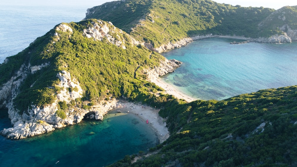 an aerial view of a small island in the middle of the ocean