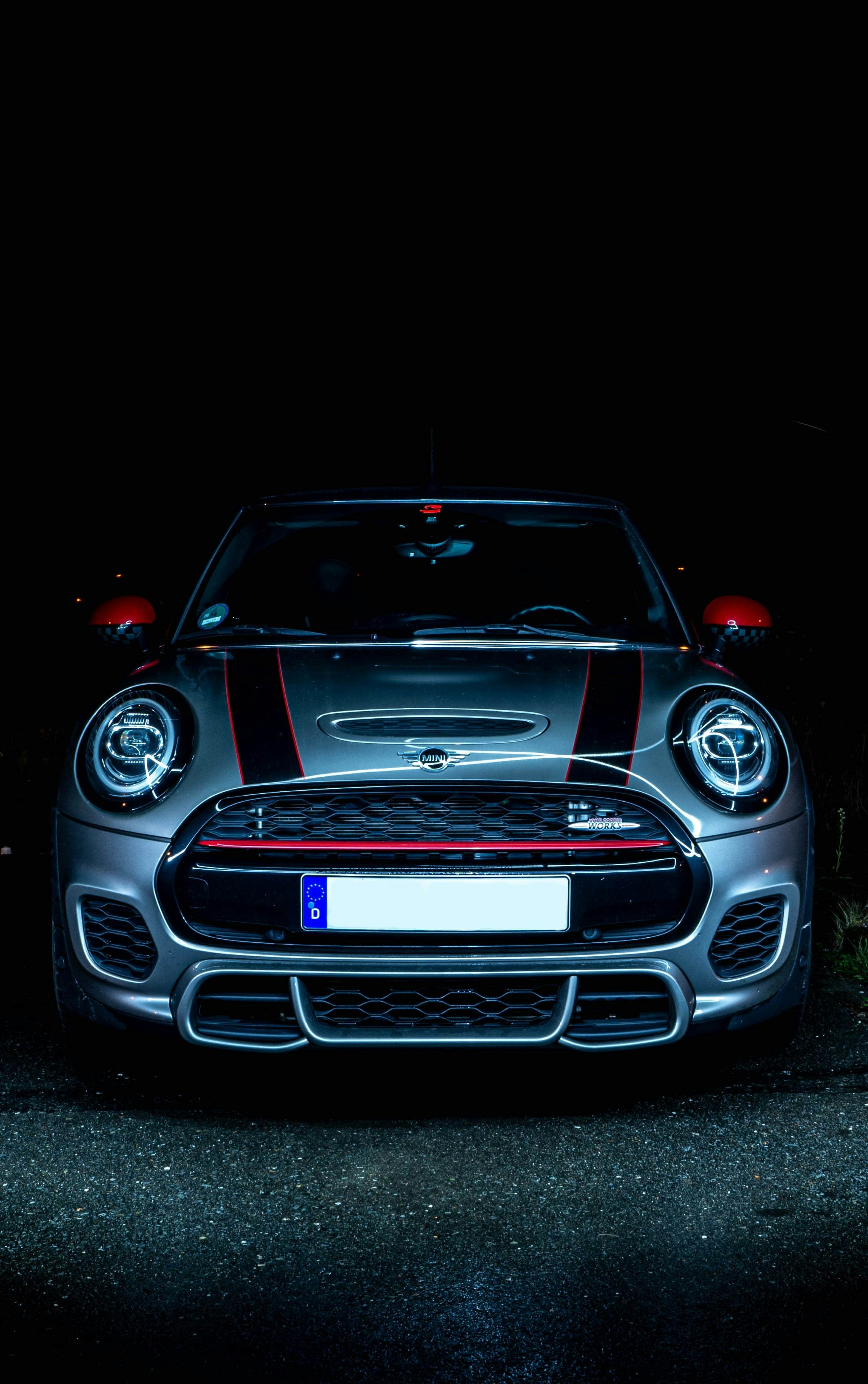 A car parked in the dark with its lights on photo – Free Car Image on ...