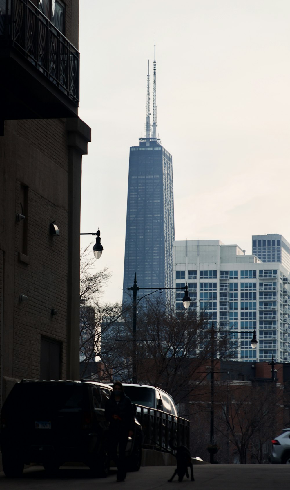 a view of a city with tall buildings in the background