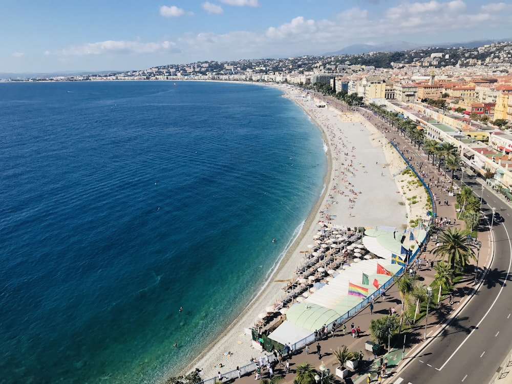 an aerial view of a beach and a city