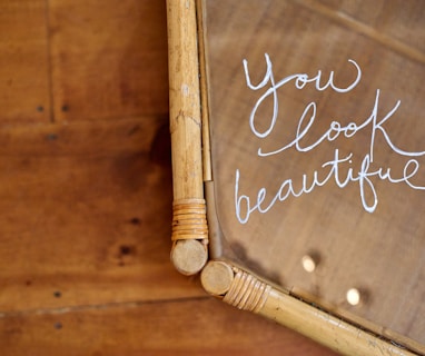 a close up of a mirror with writing on it