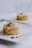 A vibrant plate of colorful, freshly prepared vegetables and grains served in a cozy setting.
