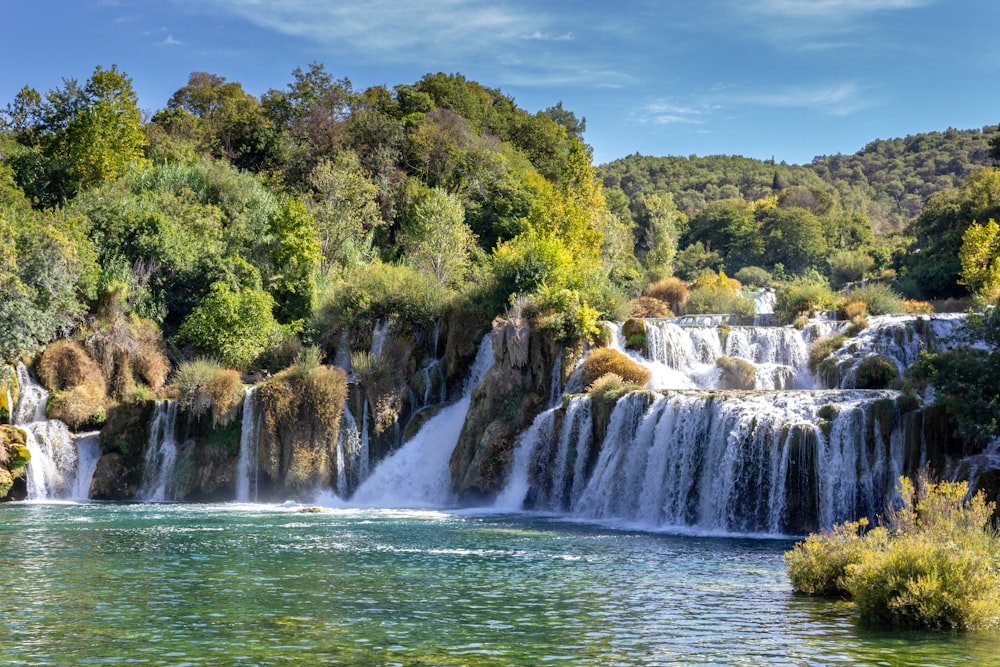 a large waterfall with lots of water running down it