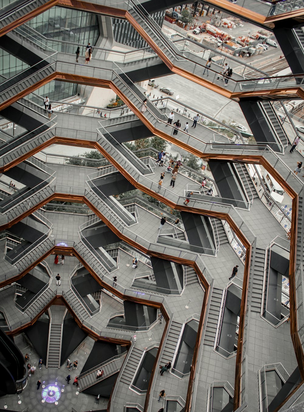 an aerial view of a building with stairs and escalators