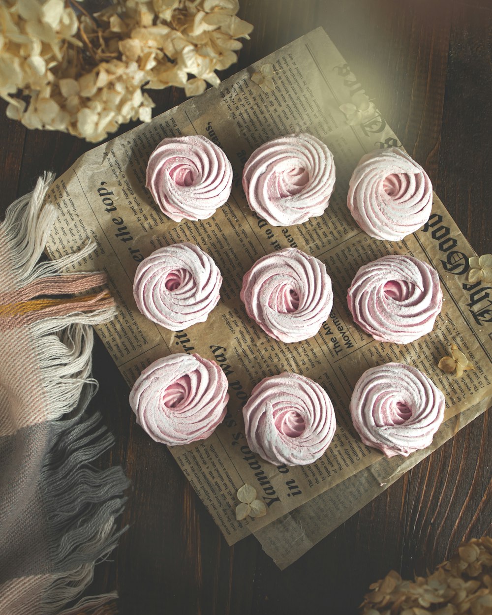 a bunch of cupcakes sitting on top of a table