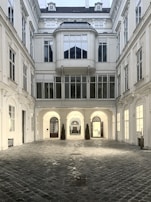 View of a charming courtyard from one of our renovated apartments in a historic building.